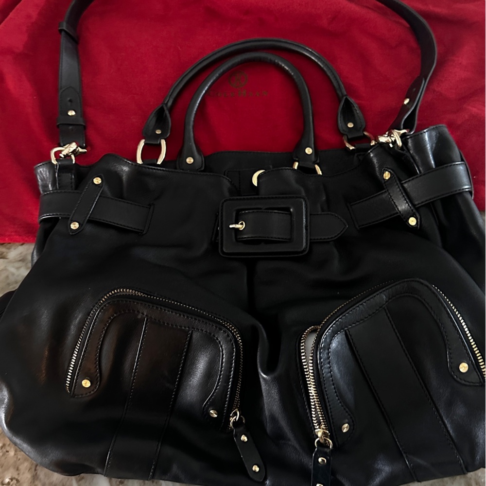 Cole Haan leather tote with waterproof inside, lots of pockets outside.